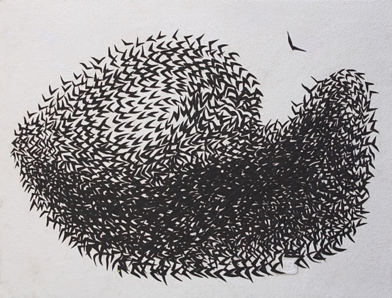 Birds Swarming, Handmade paper, Cut Paper, Cut paper arranged like birds swarming in air. Year 2010.